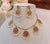 Elegant Floral Necklace Set with Ruby, Green Stones & Pearls